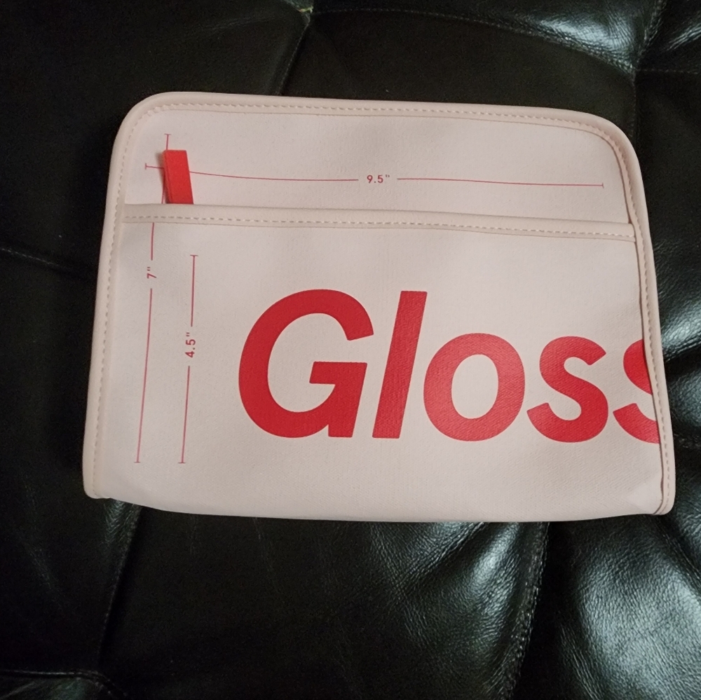 Brand New Glossier Beauty bag with dust bag.